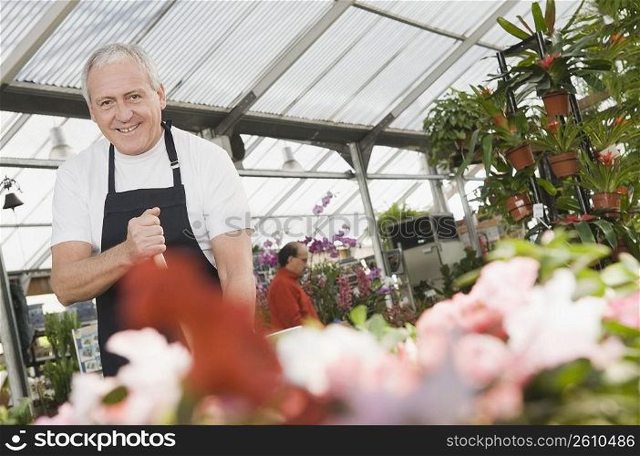 Man working in a garden center