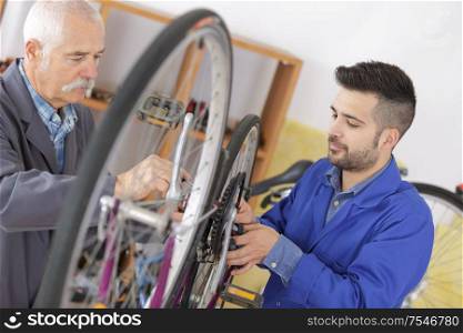 man working in bike workshop