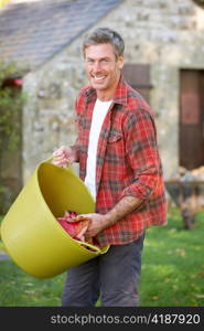 Man working in country garden