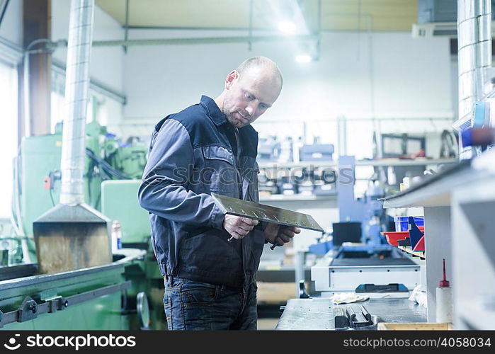 Man working in grinding workshop