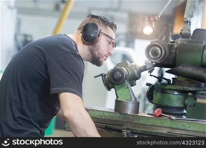 Man working in grinding workshop