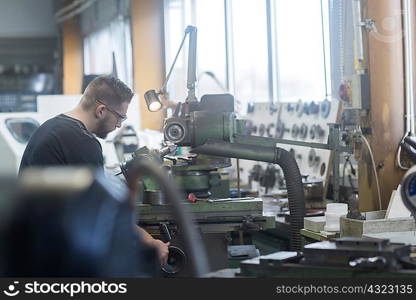 Man working in grinding workshop