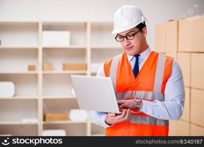 Man working in postal parcel delivery service office