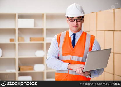 Man working in postal parcel delivery service office