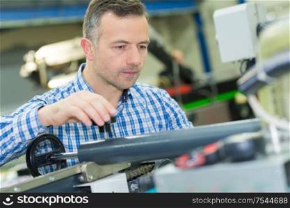 man working in printing factory