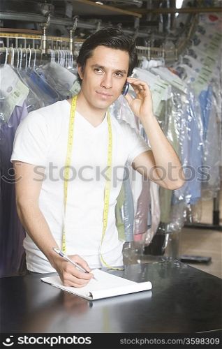 Man working in the laundrette