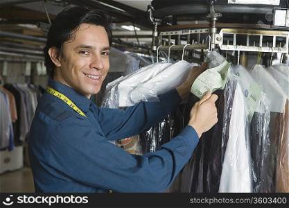 Man working in the laundrette