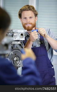 man working on an engine