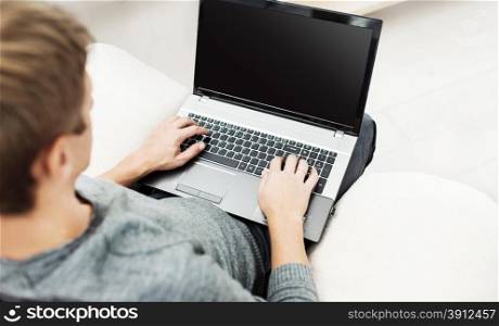 Man working on the laptop at home
