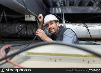 man working on the roof
