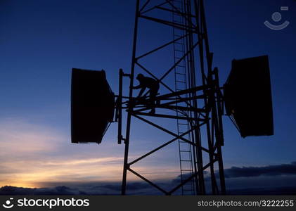 Man Working on Tower