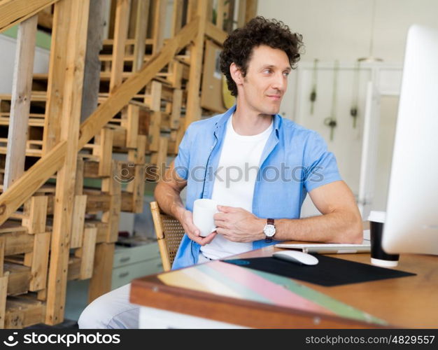 Man working with drafts in office