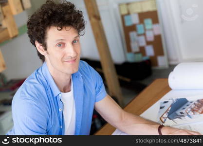 Man working with drafts in office