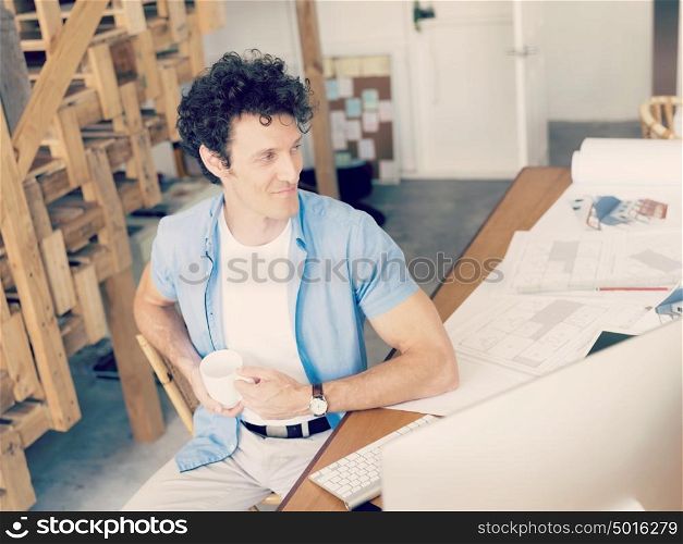 Man working with drafts in office