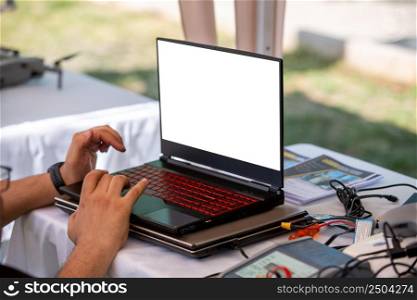 Man working with his computer outdoors in Turkey