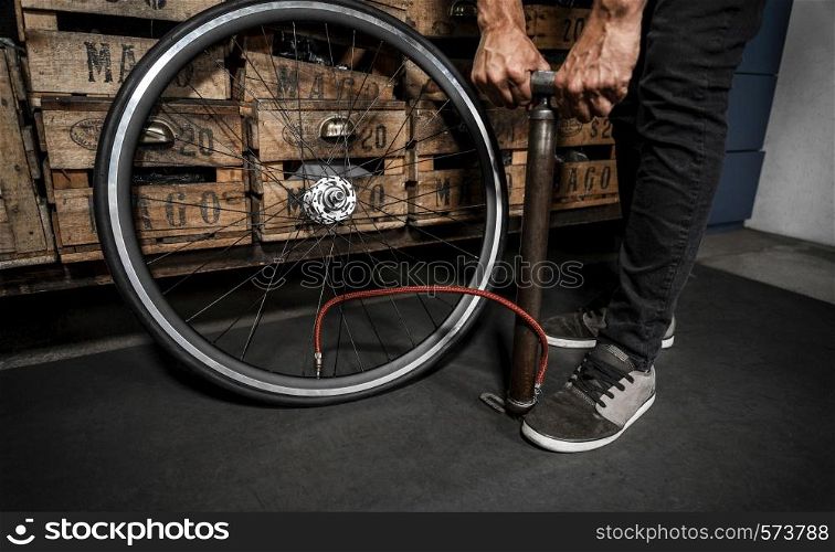 man workshop creating bike 10