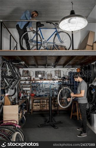 man workshop creating bike 15