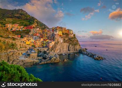 Manarola, Colorful cityscape on the mountains over Mediterranean sea in Cinque Terre Italy Europe
