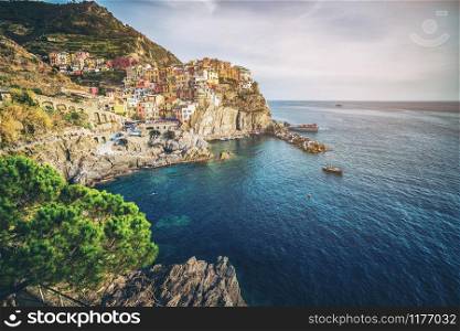 Manarola Village, Cinque Terre Coast of Italy. Manarola is a beautiful small town in the province of La Spezia, Liguria, north of Italy and one of the five Cinque terre travel attractions to tourists.