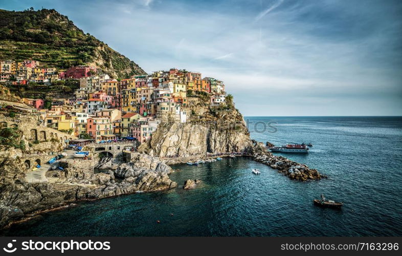 Manarola Village, Cinque Terre Coast of Italy. Manarola is a beautiful small town in the province of La Spezia, Liguria, north of Italy and one of the five Cinque terre travel attractions to tourists.