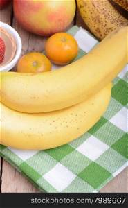 mandarin, bananas and apples, health fresh food close up