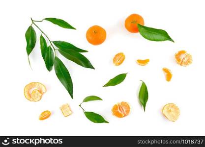 Mandarin fruit, leaves, peel isolated on white background. Top view.