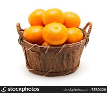 Mandarin in basket isolated on white