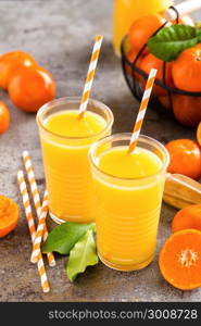 Mandarin orange juice. Refreshing summer drink. Fruit refreshment beverage