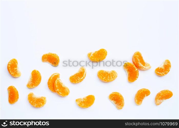 Mandarin segments, Fresh orange isolated on white background. Top view