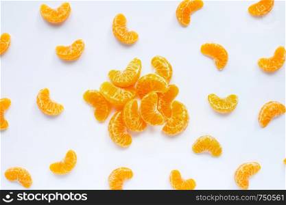 Mandarin segments, Fresh orange isolated on white background. Top view