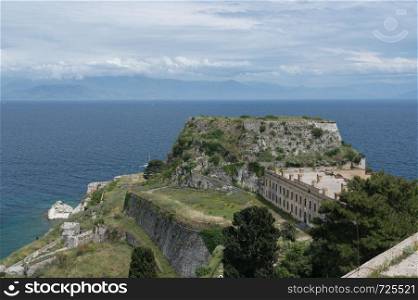 Mandraki tower in the Old Fortress in the town of Corfu. Old Fortress of Corfu on promontory by old town