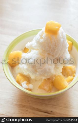 Mango bingsu on table, Korean dessert