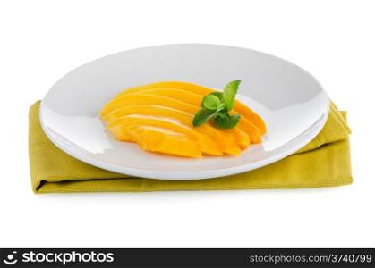 Mango fruit on white plate on white background.