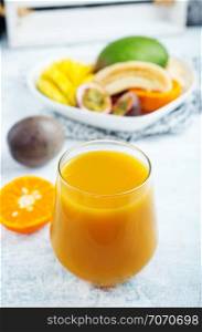 mango juice in glass, fresh juice and fruits