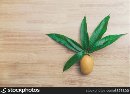 Mango on a wooden table