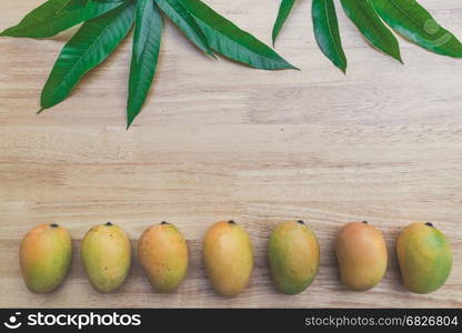 Mango on a wooden table