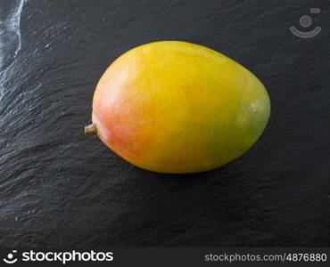 mango on slate macro closeup