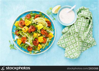 Mango shrimps salad with red pepper and lime juice. Seafood. Top view. Flat lay