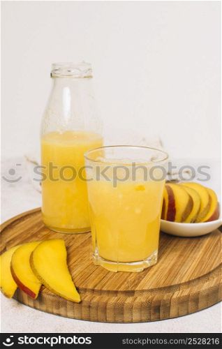 mango smoothie with white background