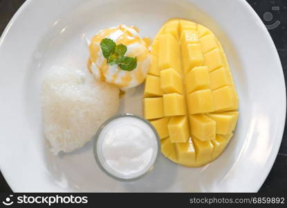 Mango with sticky rice and ice cream
