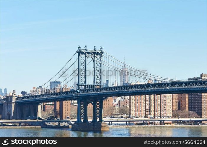 Manhattan Bridge and skyline view from Brooklyn Bridge in New York City