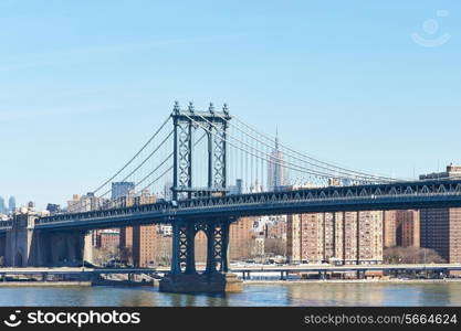 Manhattan Bridge and skyline view from Brooklyn Bridge in New York City