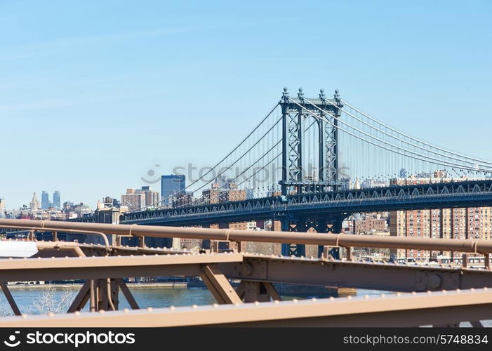 Manhattan Bridge and skyline view from Brooklyn Bridge in New York City