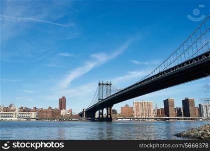 Manhattan Bridge and skyline view from Brooklyn in New York City