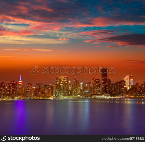 Manhattan New York skyline at sunset dusk from East River NYC USA