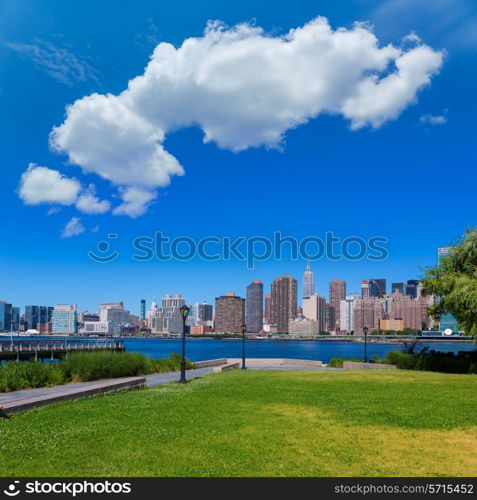 Manhattan New York sunny skyline East River NYC garden park turf USA