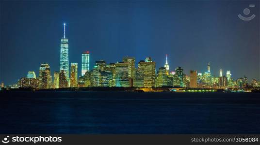 Manhattan panorama from brooklyn side at night. New york landmarks
