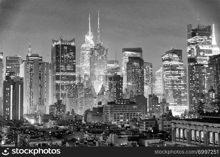 Manhattan skyline panorama at twilight, New York City.
