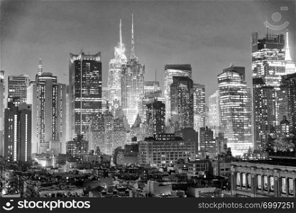 Manhattan skyline panorama at twilight, New York City.