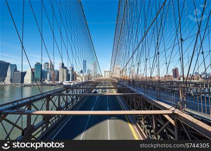 Manhattan skyline view from Brooklyn Bridge in New York City